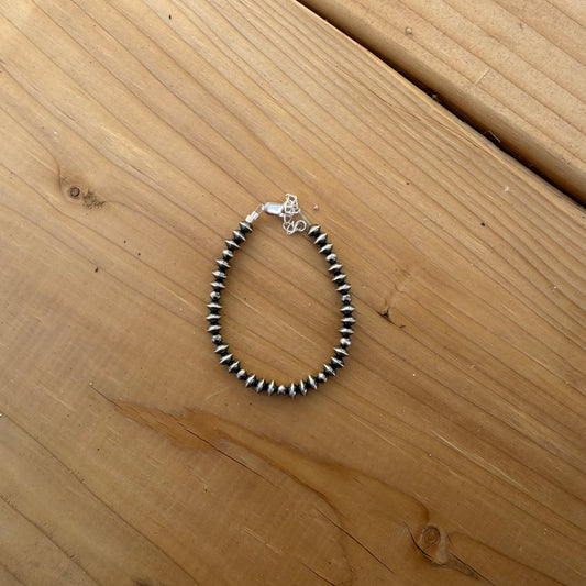 Saucer bracelet